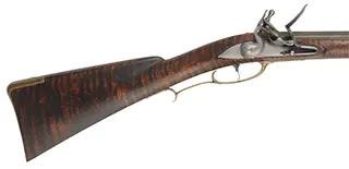 Colonial Longrifle,
.54 caliber, 43-1/2" Rice swamped barrel,
Chambers flintlock, curly maple, brass, used Colonial Longrifle,
.54 caliber, 43-1/2" Rice swamped barrel,
Chambers flintlock, curly maple, brass, used